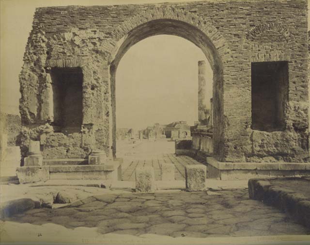VII.8.00 Pompeii, Arch of Tiberius, 4th December 1971. Looking south through arch into north-east corner of Forum. 
Photo courtesy of Rick Bauer, from Dr George Fay’s slides collection.
