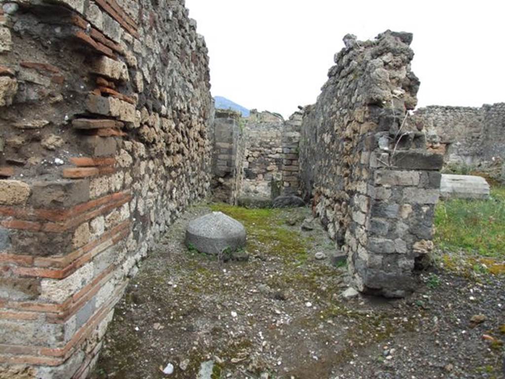 VII.9.47 Pompeii. March 2009. Room 18, exit for animals from the stable, down a slope and out from the shop at VII.9.51.  Looking north.
