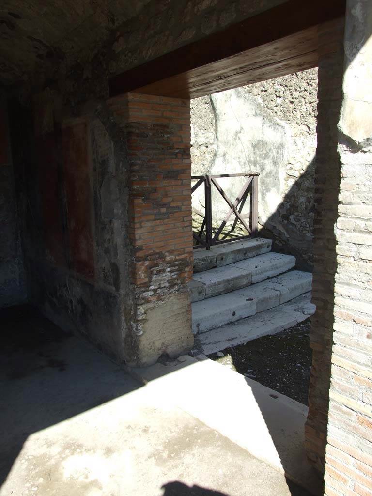 VII.9.68 Pompeii. March 2009. East side with doorway to VII.9.67, stairs and ramp to upper floor.