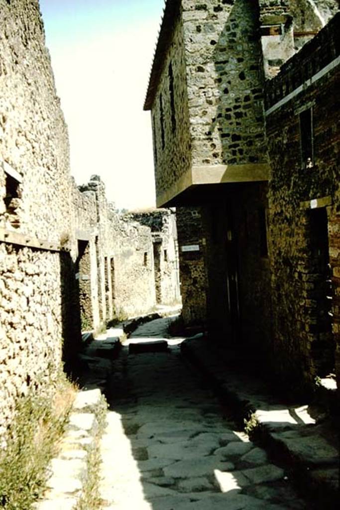 VII.12.18 and VII.12.17 Pompeii, on right. 1957. Vicolo del Lupanare, looking south. 
Photo by Stanley A. Jashemski.
Source: The Wilhelmina and Stanley A. Jashemski archive in the University of Maryland Library, Special Collections (See collection page) and made available under the Creative Commons Attribution-Non Commercial License v.4. See Licence and use details.
J57f0464
