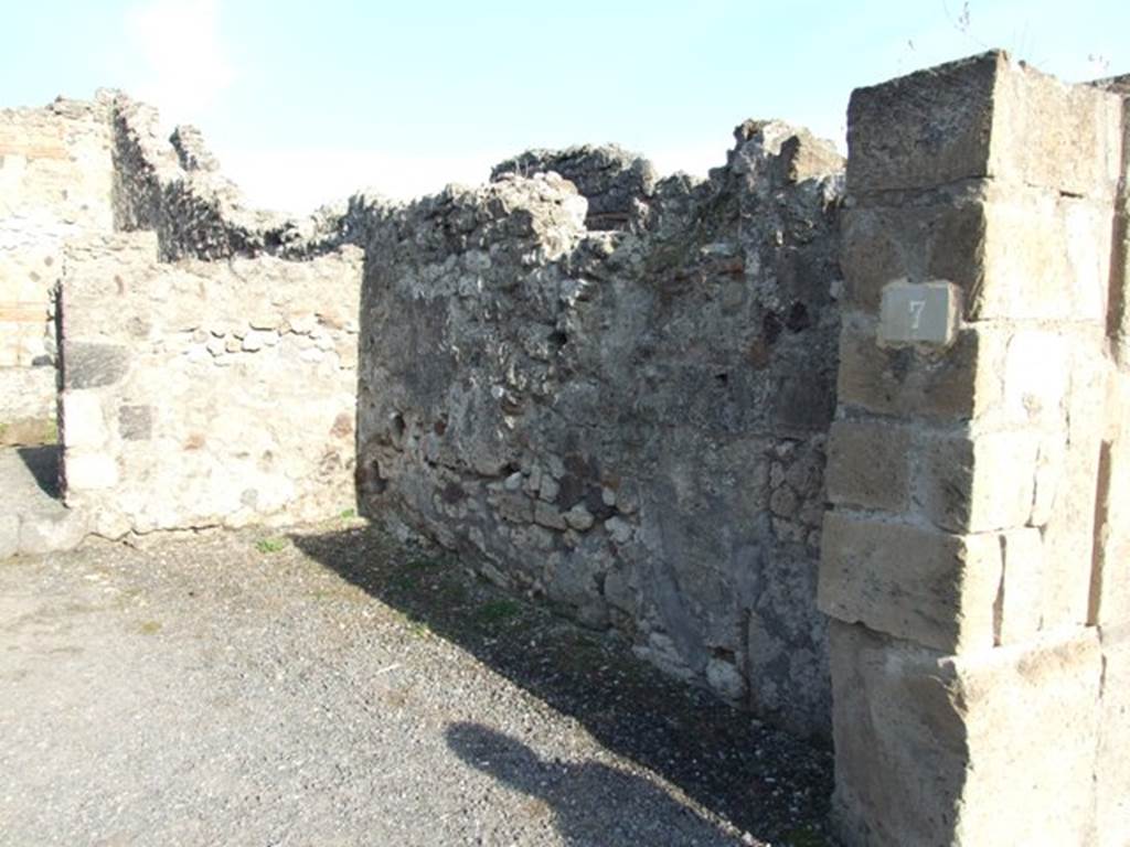 VII.13.7 Pompeii. December 2007. East wall of shop.