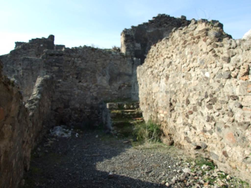 VII.13.13 Pompeii. December 2007. Looking west into dwelling.