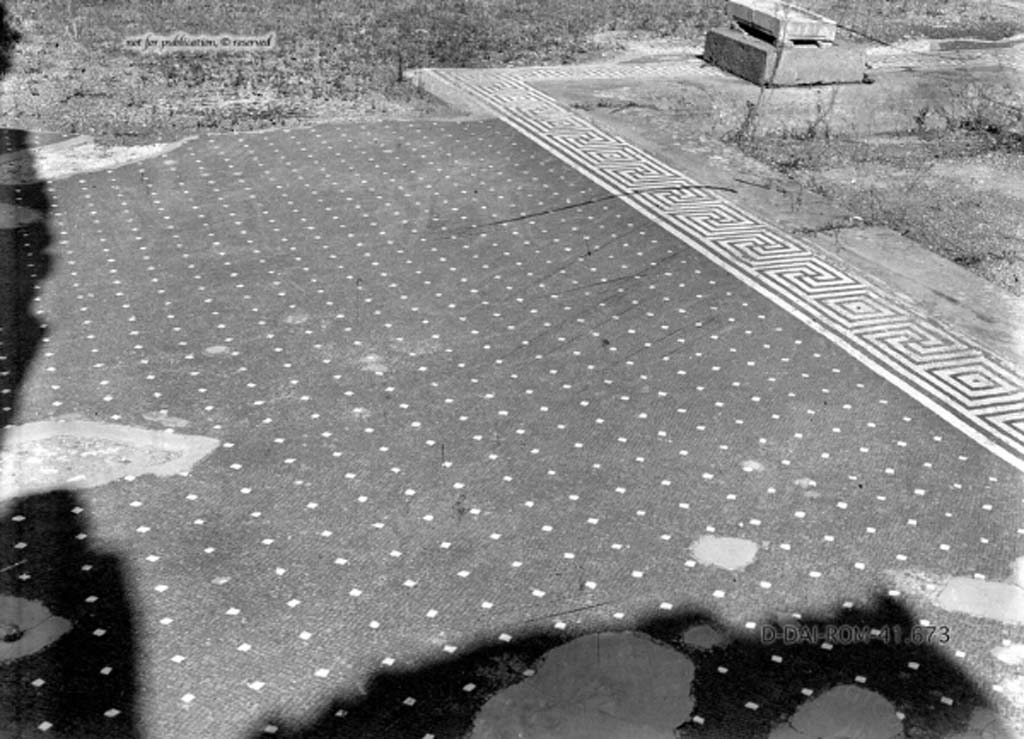 VII.15.2 Pompeii. c.1930. Looking north across west side of atrium, with impluvium, on right.
DAIR 41.673. Photo © Deutsches Archäologisches Institut, Abteilung Rom, Arkiv.
See Pernice, E.  1938. Pavimente und Figürliche Mosaiken: Die Hellenistische Kunst in Pompeji, Band VI. Berlin: de Gruyter, (taf. 27.2.)

