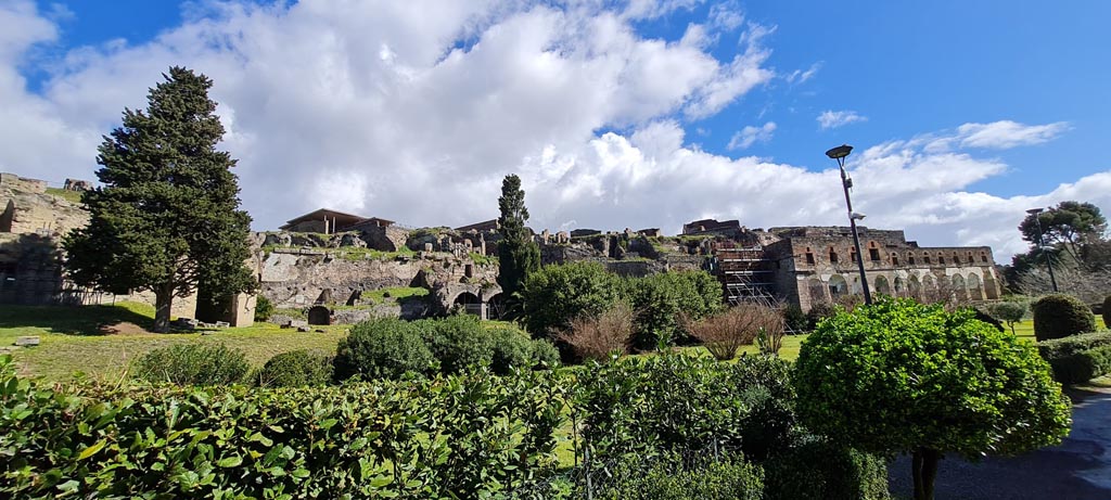 VIII.1.3 Pompeii, upper left. April 2022. 
Looking east with view of VIII.1 and VIII.2 from exit of site. Photo courtesy of Giuseppe Ciaramella.
