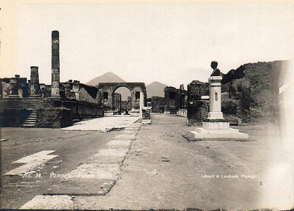 VII.8 Pompeii Forum. 1910. Bust of Giuseppe Fiorelli, now in the Larario dei Pompeianisti. Photo courtesy of Ross Turner.
The bronze bust of Fiorelli was erected in the Forum at Pompeii in 1895, a year before his death.  
The inscription on the front of the pedestal reads:

          IOSEPHO FIORELLI
DE ANTIQVITA TIBUS POMPEIANIS
            OPTIME MERITO
       EX PVBLICO DECRETO
          CIVES VIVENTI CIVI
             POSVERVNT
              MDCCCXCV
