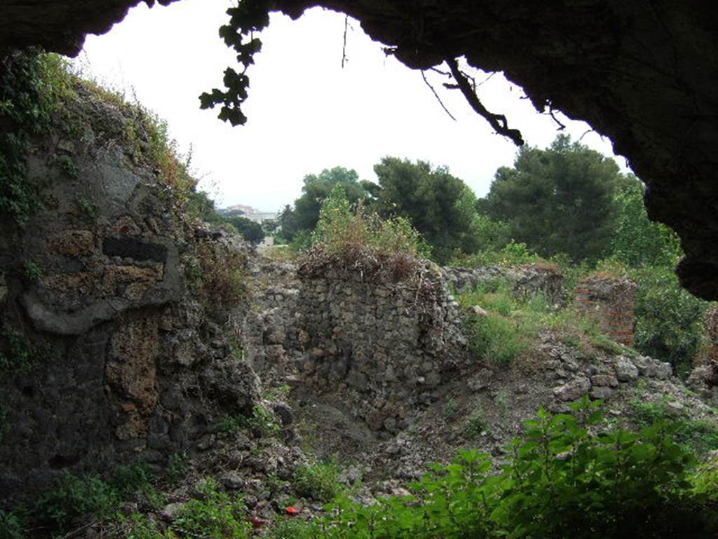 VIII.2.29 Pompeii. May 2006. Looking south from room on lower floor into area, possibly east side of kitchen.