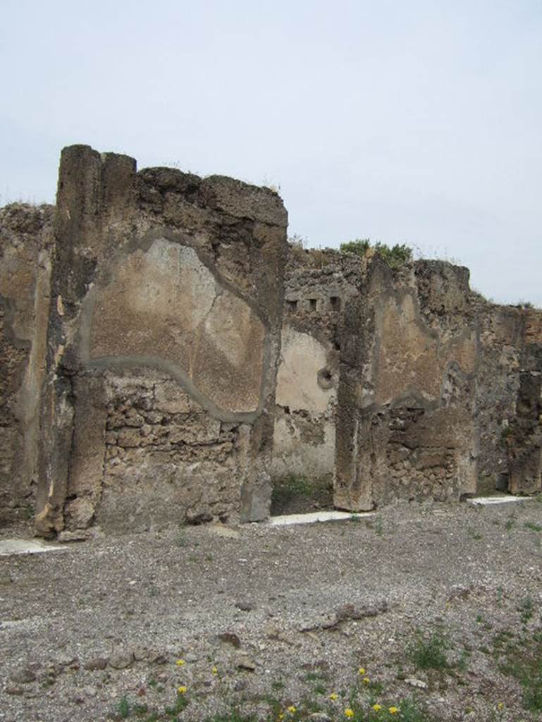 VIII.2.34 Pompeii. May 2006. Looking west through middle doorway of small room, on west side of atrium. 