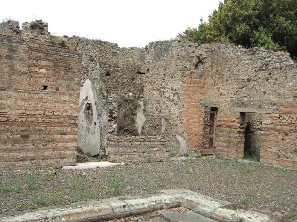 VIII.2.39 Pompeii.  May 2006.  Doorways to Rooms l, m, n and kitchen. North west corner of atrium.