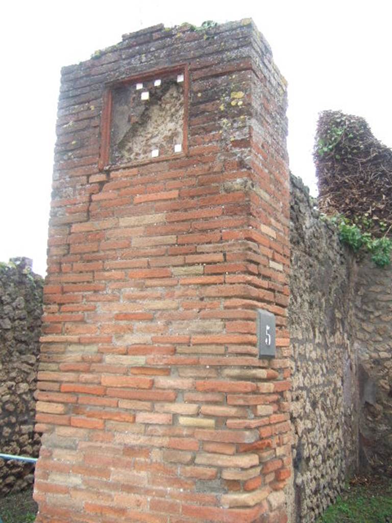 VIII.3.5 Pompeii. December 2005. Pilaster between VIII.3.6 and VIII.3.5.   