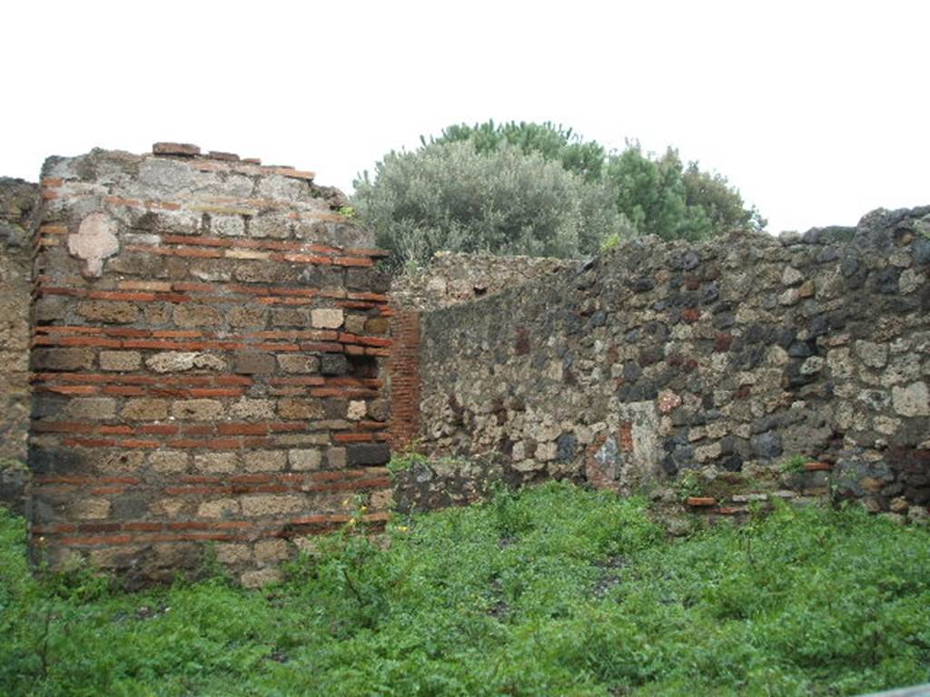 VIII.3.15 Pompeii. December 2004. Looking north-east from entrance doorway, towards garden area.
This would have been the doorway in the north wall of room 9 leading onto south portico 8.
