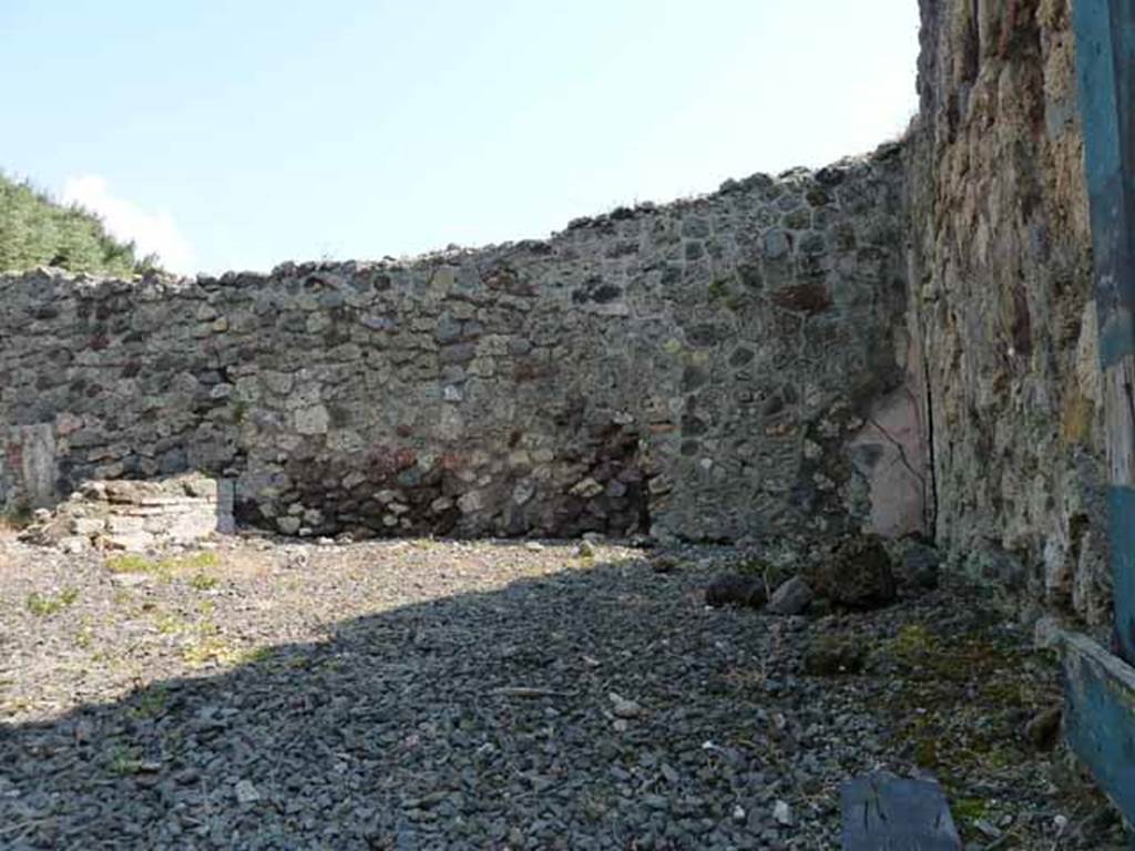 VIII.3.15 Pompeii. May 2010. Looking east from entrance towards area of room 9 in south-east corner.