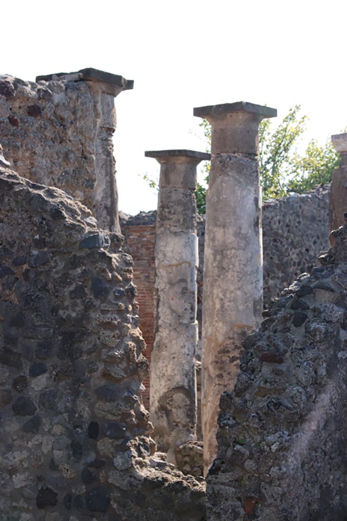 VIII.3.28 Pompeii. October 2022. 
Looking south-east across rear room, towards the portico in VIII.3.27. Photo courtesy of Klaus Heese. 
