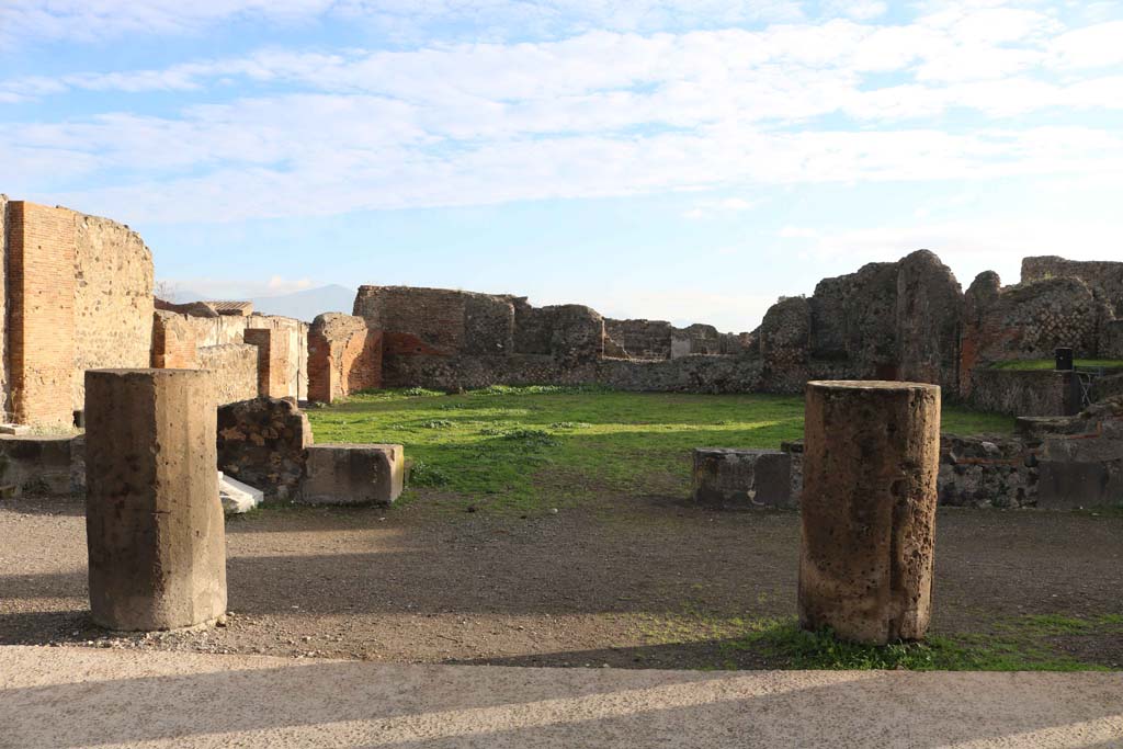 VIII.3.32, Pompeii. December 2018. Looking east across Forum portico towards entrance doorway. Photo courtesy of Aude Durand.