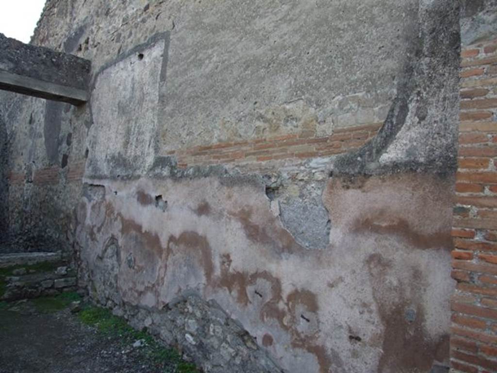 VIII.4.7 Pompeii. December 2007. West wall of shop.