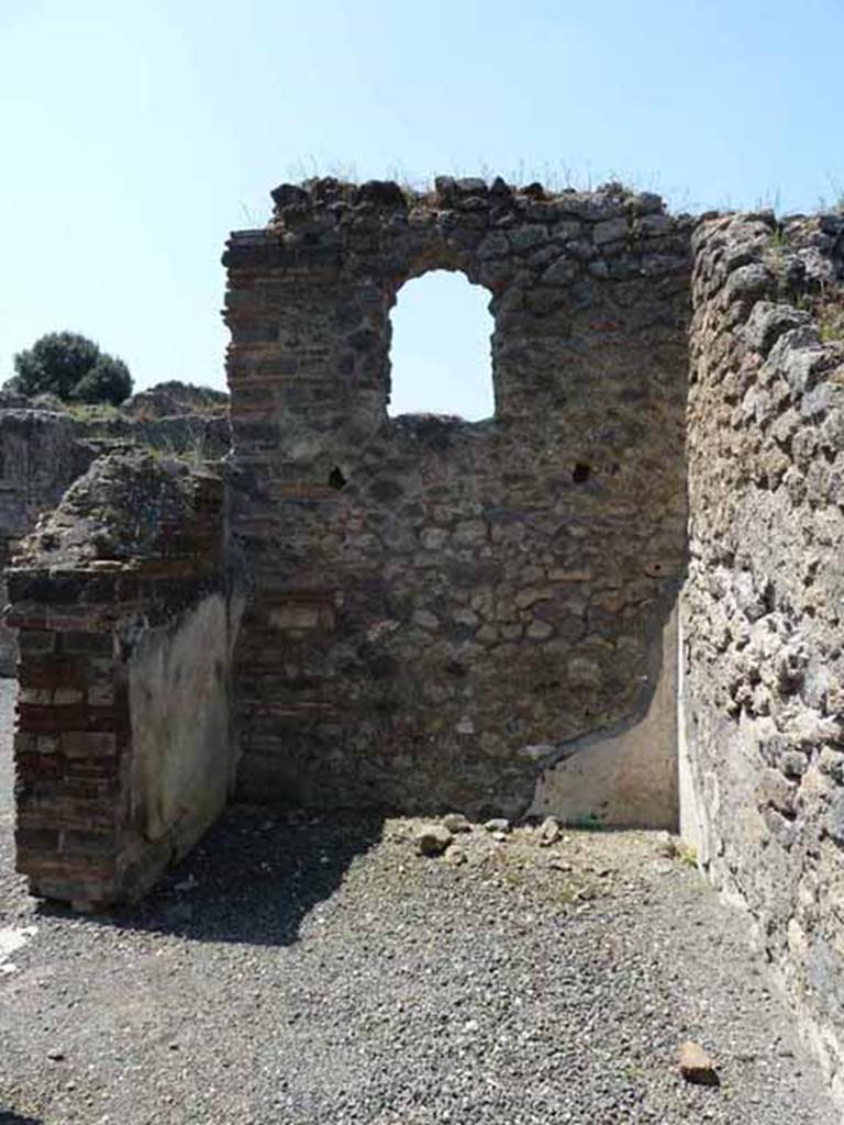 VIII.5.24 Pompeii. May 2010. Room 5, west wall.