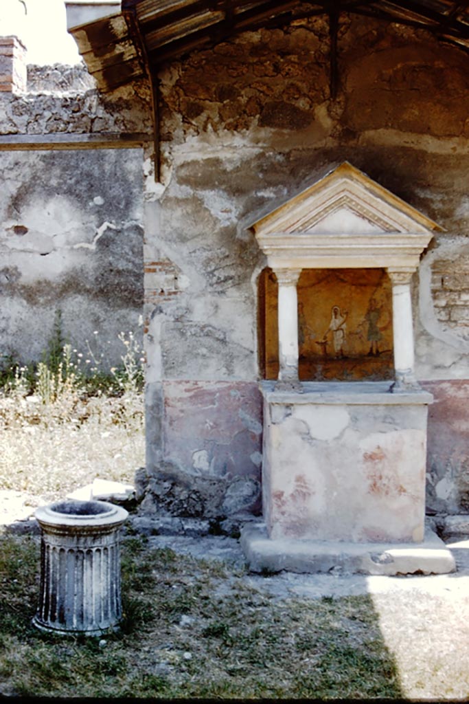 VIII.5.37 Pompeii. 1959. 
Room 1, aedicula lararium in atrium. Photo by Stanley A. Jashemski.
Source: The Wilhelmina and Stanley A. Jashemski archive in the University of Maryland Library, Special Collections (See collection page) and made available under the Creative Commons Attribution-Non-Commercial License v.4. See Licence and use details.
J59f0338
