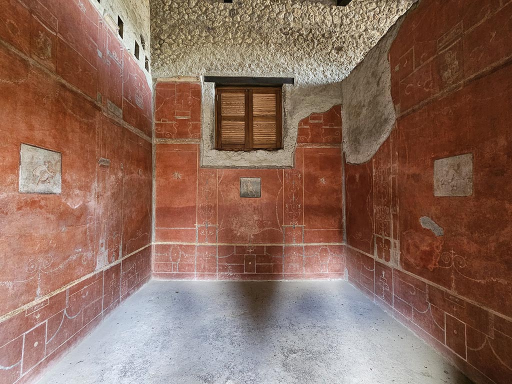 VIII.5.37 Pompeii. November 2024. Room 14, looking west through doorway of oecus. Photo courtesy of Annette Haug.

