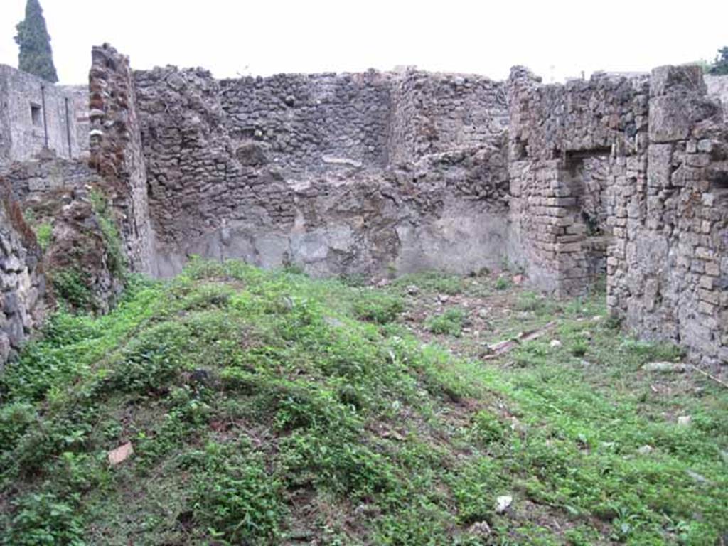 VIII.7.1 Pompeii. September 2010. Looking north across site of garden area. Photo courtesy of Drew Baker. The doorway to the dormitory room can be seen on the right. On the left, according to Jashemski was a garden painting found on the north part of the west wall. See Jashemski, W. F., 1993. The Gardens of Pompeii, Volume II: Appendices. New York: Caratzas. (p.220)
