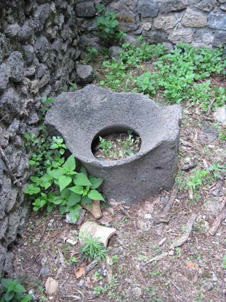 VIII.7.6 Pompeii. September 2010. Detail of feature mill capstone from room 4. Photo courtesy of Drew Baker.
