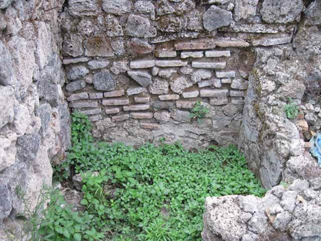 VIII.7.10 Pompeii. September 2010. Site of kitchen, described by Eschebach as having hearth, well and lararium. See Eschebach, L., 1993. Gebäudeverzeichnis und Stadtplan der antiken Stadt Pompeji. Köln: Böhlau. (p. 389)
According to Boyce, in the wall of the kitchen there was a niche and beside it was a lararium painting. It represented a sacrificial scene with the Genius and the tibicen, one on each side of an altar. On either side of them was a Lar. In the lower zone was a single serpent beside and altar.
See Boyce G. K., 1937. Corpus of the Lararia of Pompeii. Rome: MAAR 14. (p.78, no.377) 
See Sogliano, A., 1879. Le pitture murali campane scoverte negli anni 1867-79. Napoli: (p.12, no.24, “badly preserved”)
