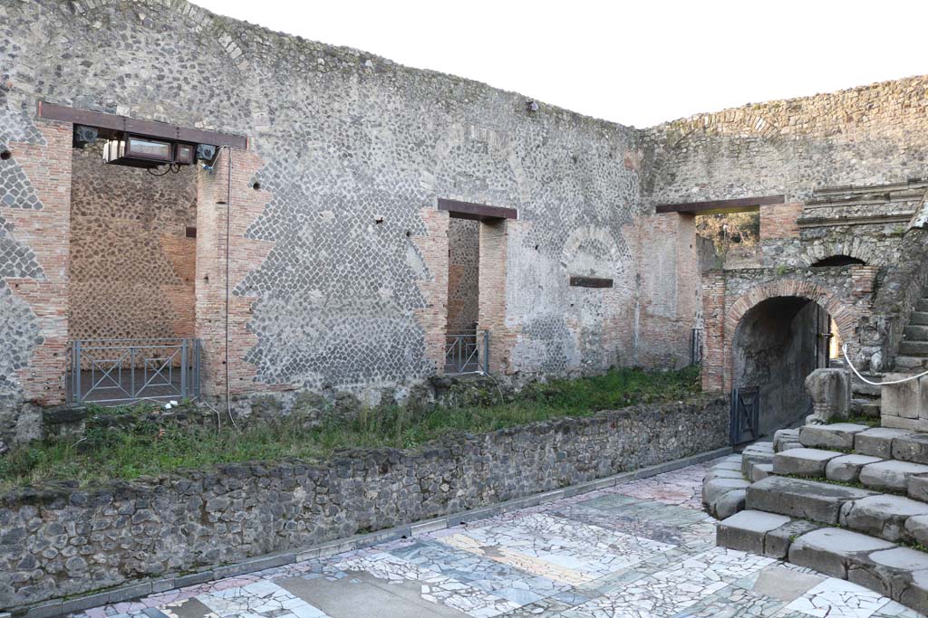VIII.7.19 Pompeii. December 2018. 
Looking south-west towards stage and doorways to VIII.7.17, left and centre. Photo courtesy of Aude Durand.
