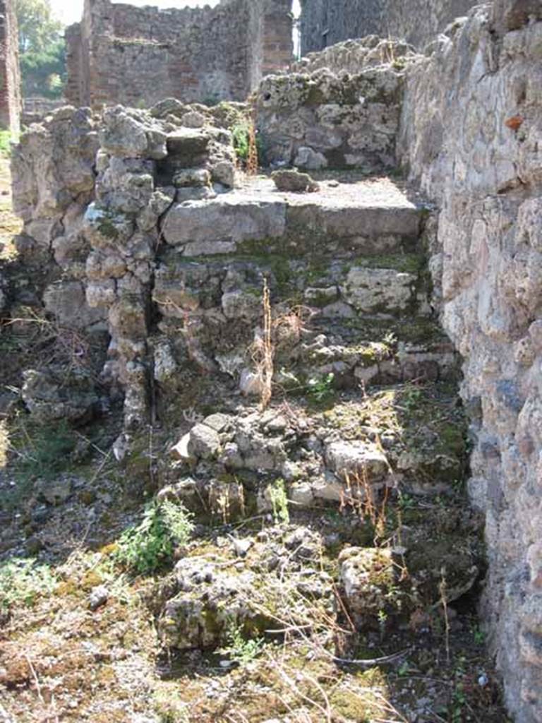 VIII.7.26 Pompeii. September 2010. Steps to upper floor, looking south.
Photo courtesy of Drew Baker.
