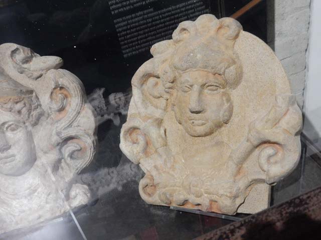 VIII.7.31 Pompeii. February 2021. Display of terracotta ex-votos of female heads, on display in Antiquarium. 
Photo courtesy of Fabien Bièvre-Perrin (CC BY-NC-SA).
