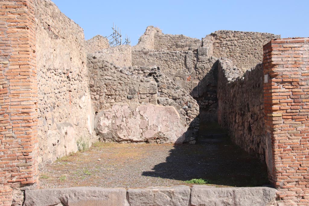 IX.1.1 Pompeii. October 2022. Looking east across shop-room. Photo courtesy of Klaus Heese.