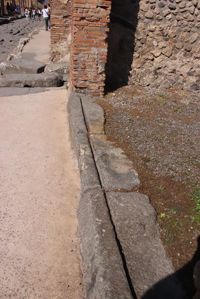 IX.1.1 Pompeii. October 2022. 
Looking north along entrance doorway threshold. Photo courtesy of Klaus Heese.
