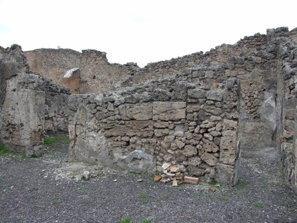 IX.1.12 Pompeii. December 2007. Two doorways to rooms on north side of atrium.