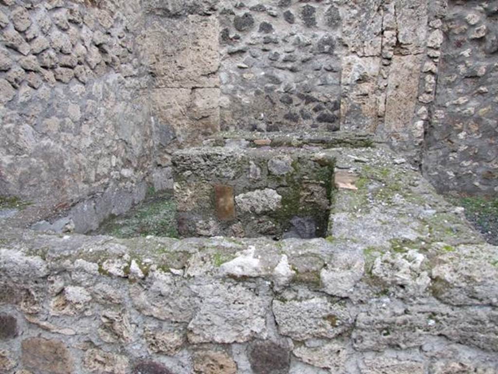 IX.1.13 Pompeii. December 2007. Counter with remains of hearth.