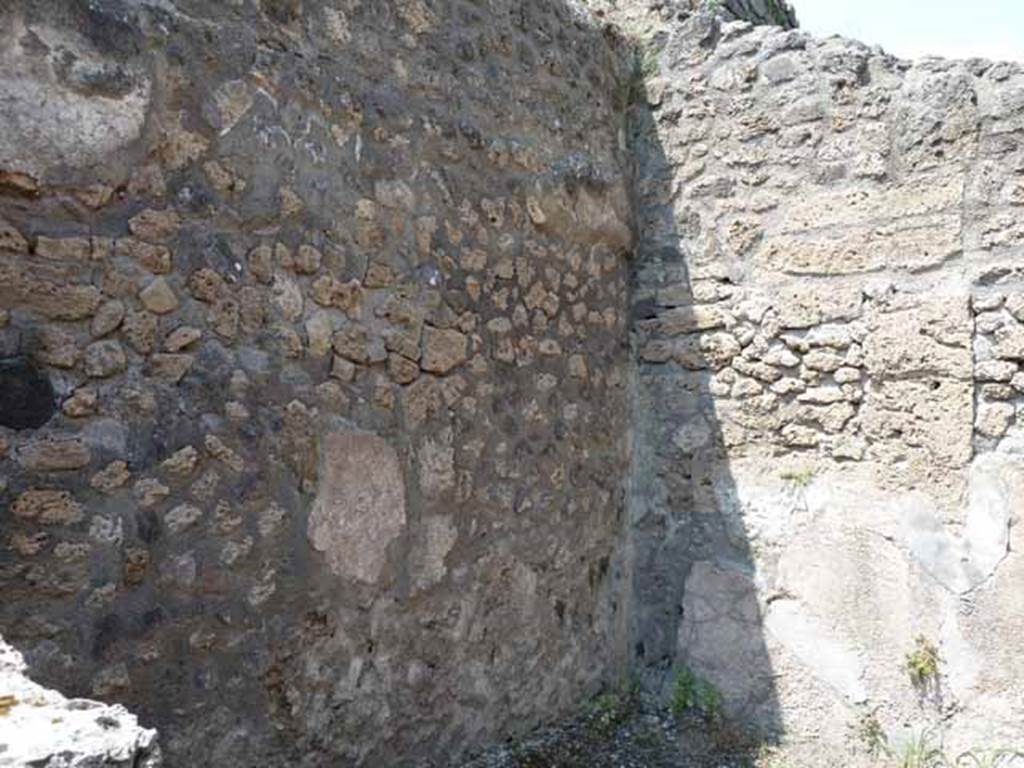 IX.1.24 Pompeii. May 2010. West wall of rear room.