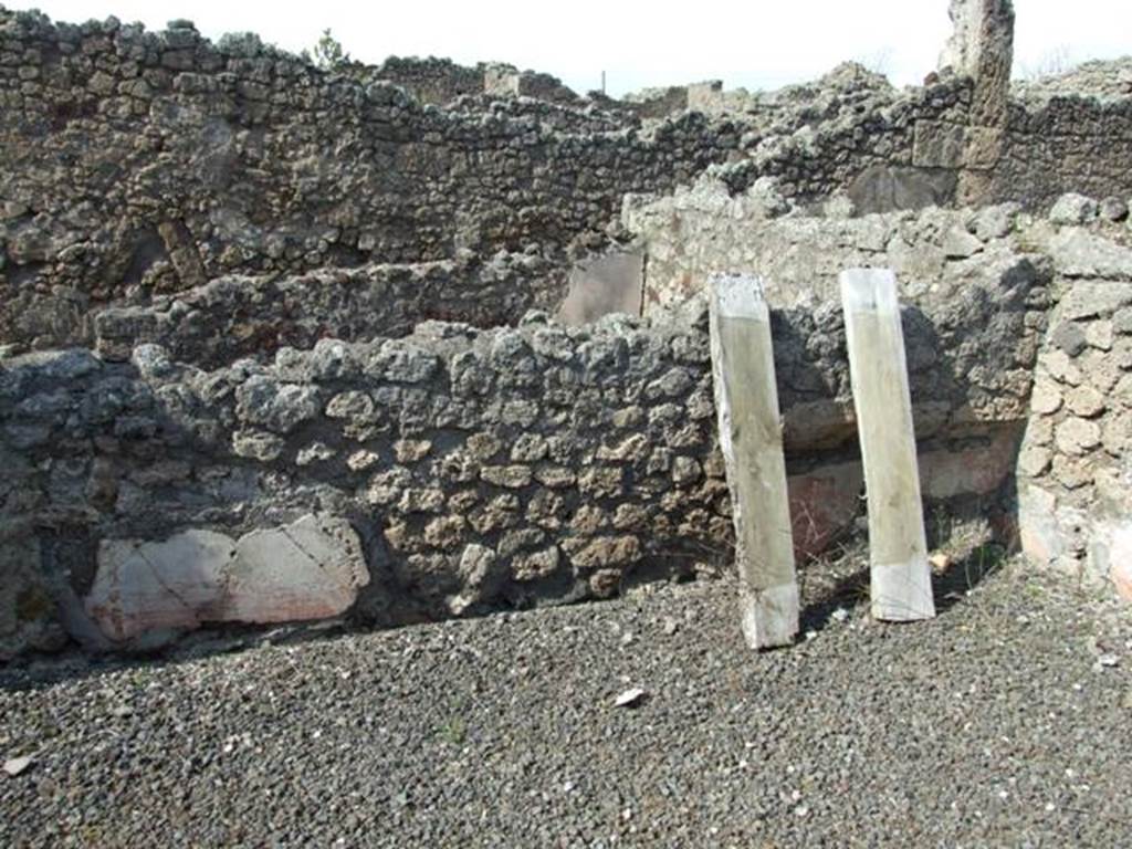 IX.2.17 Pompeii.  March 2009.  Room 8, Triclinium.  North wall, with remains of painted plaster, and recess.