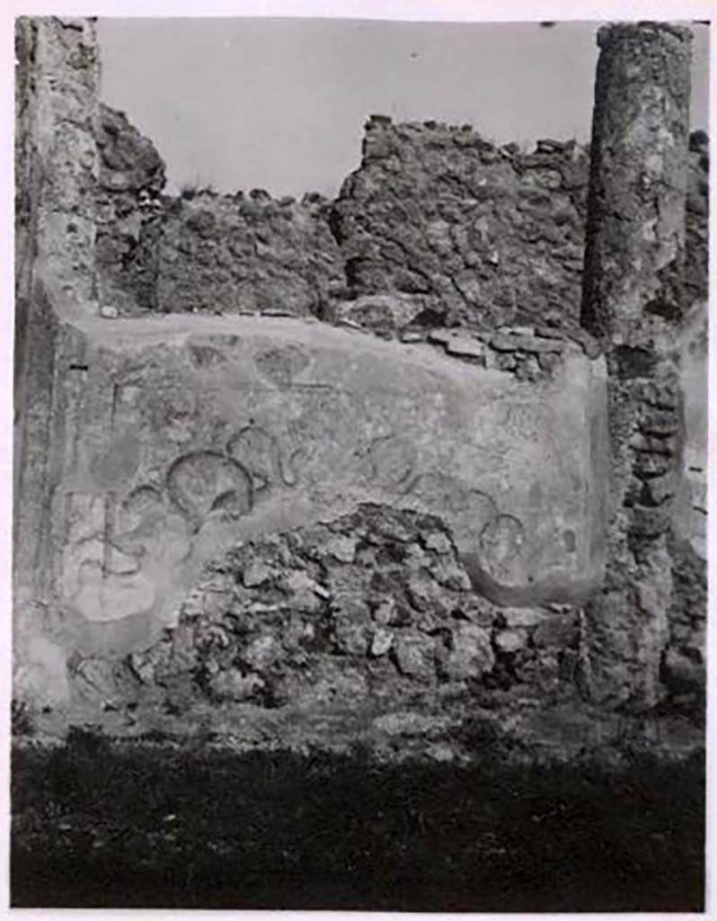 IX.2.17 Pompeii. Pre-1943. Photo by Tatiana Warscher.
Room 9, painted lararium on south side of north wall at west end of garden area.  
See Warscher, T. Codex Topographicus Pompeianus, IX.2. (1943), Swedish Institute, Rome. (no.94.), p. 174.
