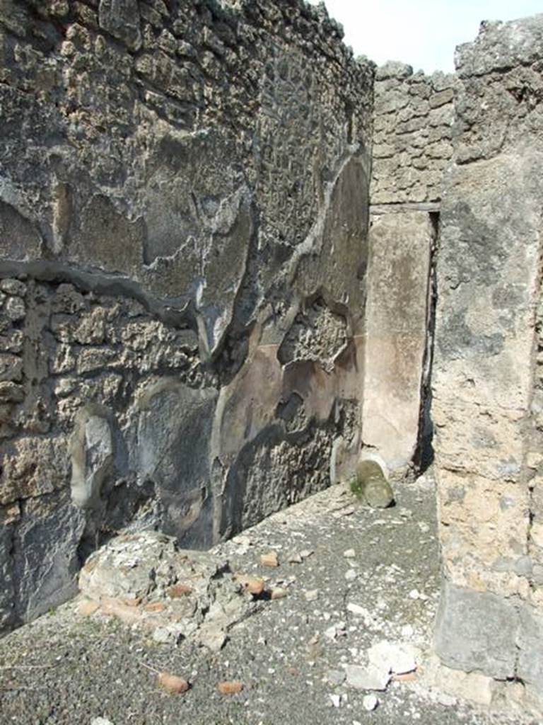 IX.2.18 Pompeii. March 2009. Room 11, garden area.  East portico with remains of steps to upper floor against north wall.  Looking east into room 13, corridor to atrium.
