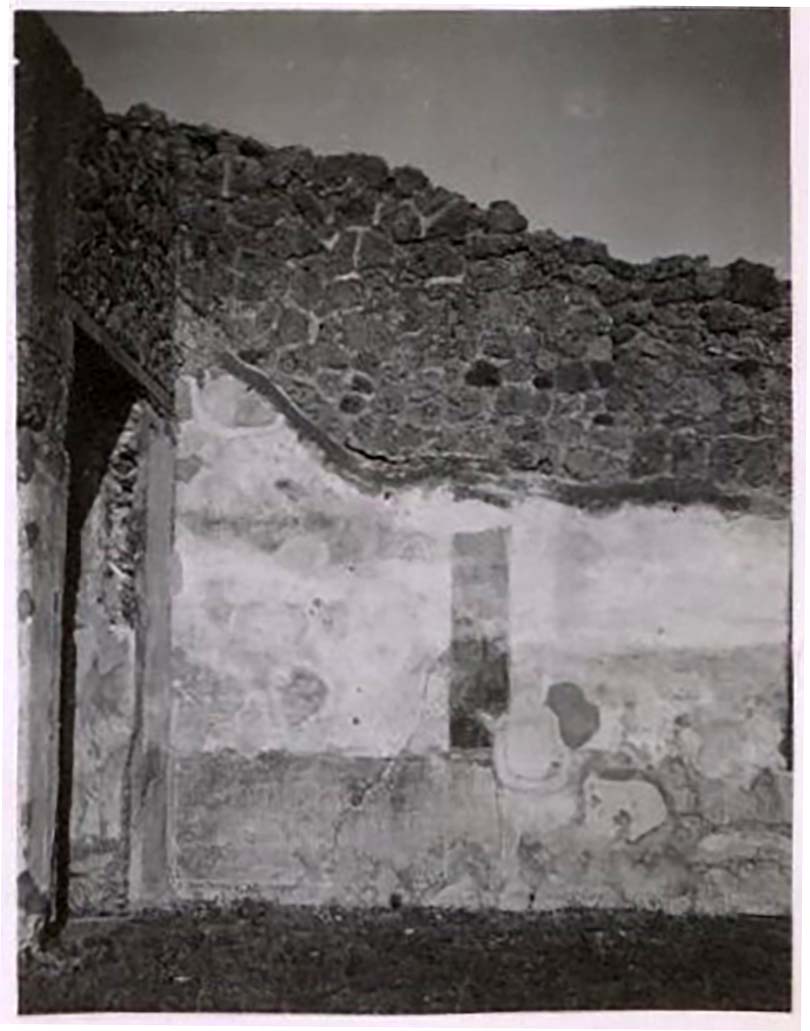 IX.2.18 Pompeii. March 2009. Room 13, corridor to atrium. The remains of the lower masonry steps (in the lower left) would have lead to the rooms on the upper floor via a wooden staircase. The line of the stairs can be seen in the remaining plaster of the left wall. 

