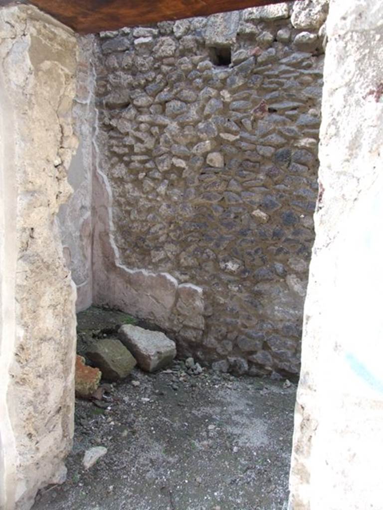 IX.3.5 Pompeii. March 2009. 
Room 2, small room on north side of entrance fauces, looking north at west end.

