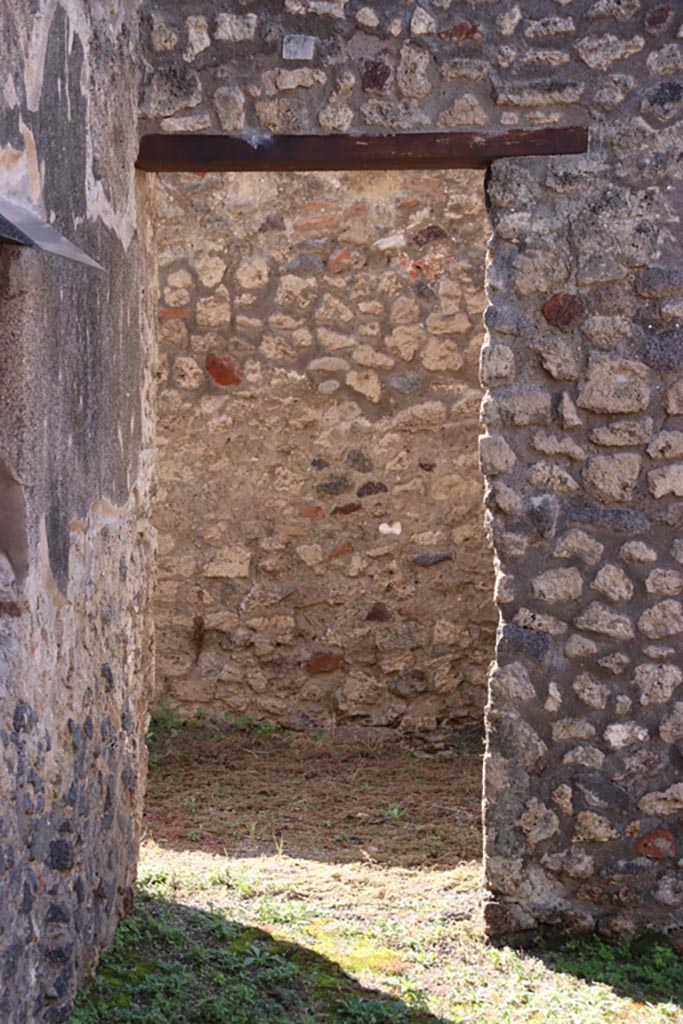 IX.3.20 Pompeii. October 2022. 
Doorway to room 9, in south-west corner of bakery room 1. Photo courtesy of Klaus Heese. 
