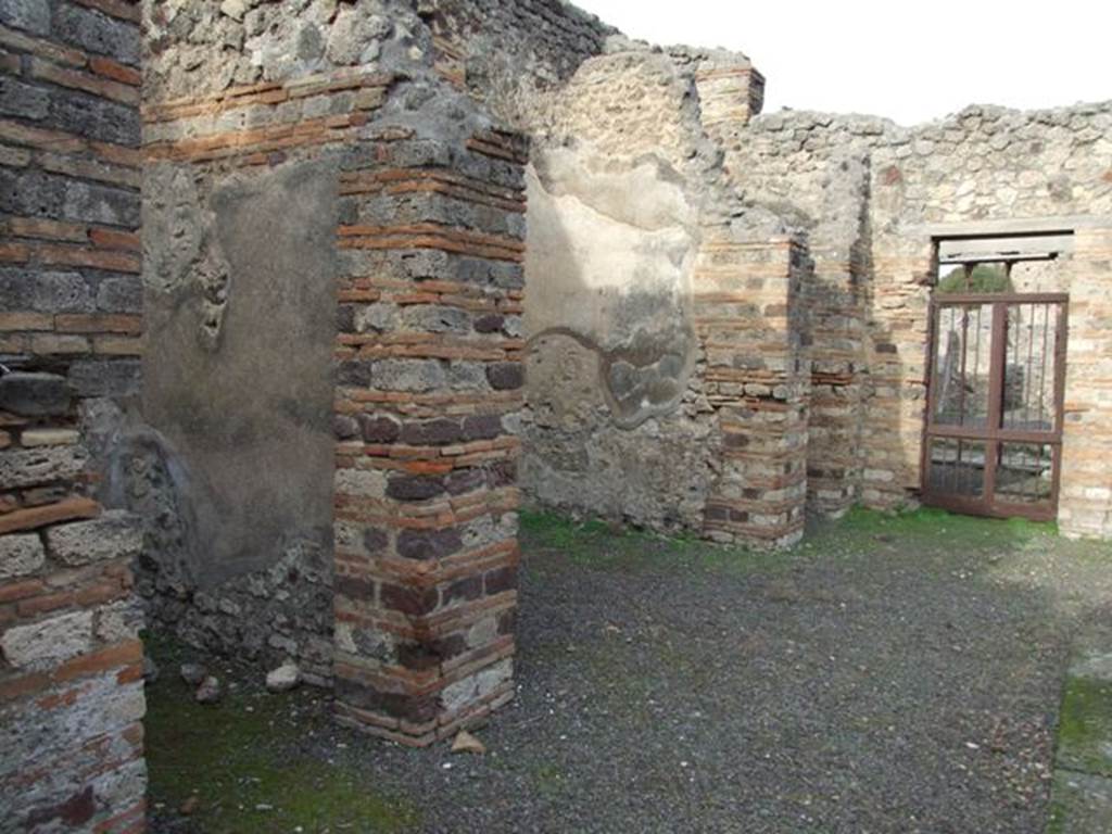 IX.5.2 Pompeii. December 2007.  Looking north-west across atrium to rooms 7, 6, 5 and doorway to IX.5.1.
