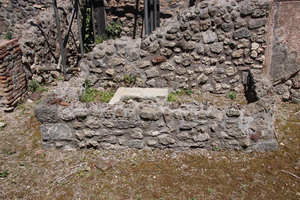 IX.6.7 Pompeii. May 2024. Room “p” kitchen, east side with tub/basin against room “r”. Photo courtesy of Klaus Heese.