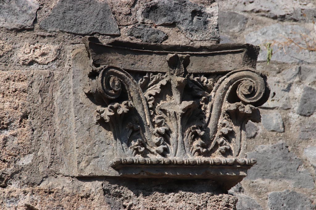 IX.7.3 Pompeii. October 2023. Corinthian capital on west (left) side of doorway. Photo courtesy of Klaus Heese.