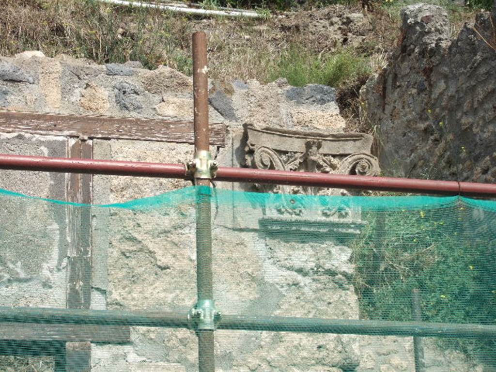 IX.7.3 Pompeii. September 2005. One of the Corinthian capitals, during restoration of the façades.