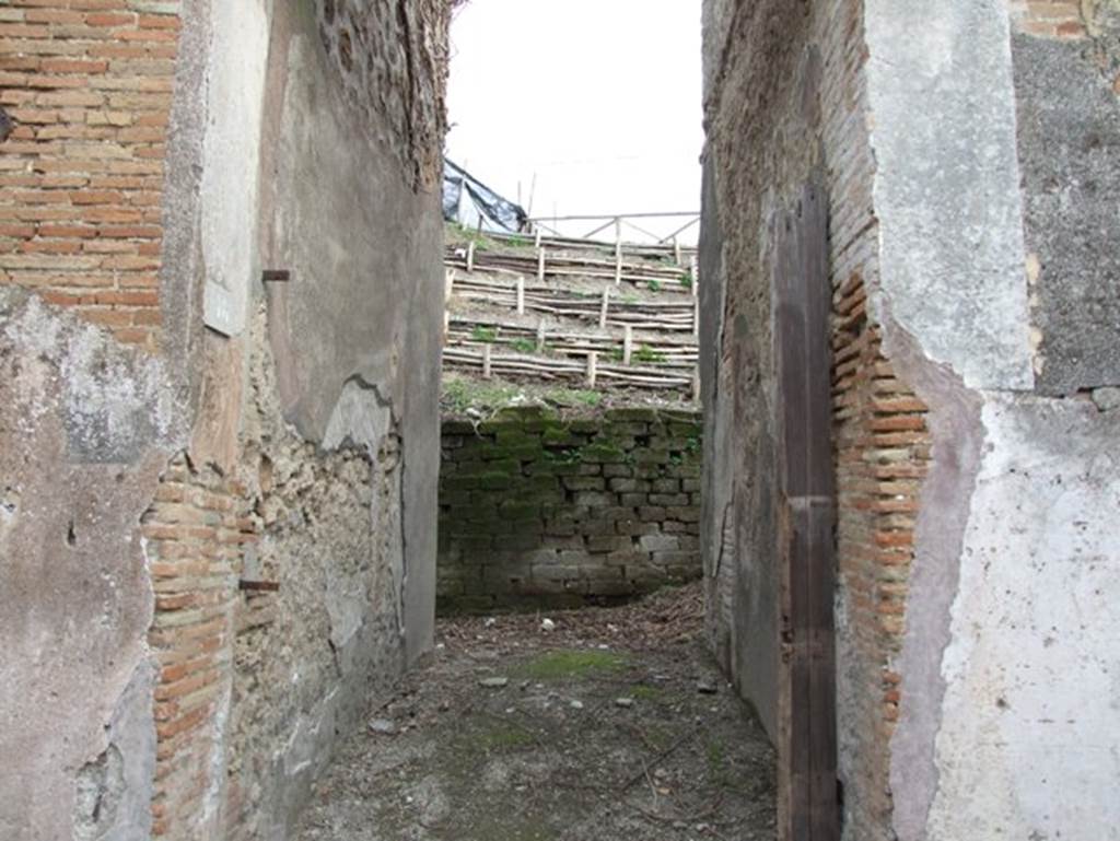 IX.7.16, Pompeii. December 2007. Looking east along entrance corridor, into the unexcavated/reburied.