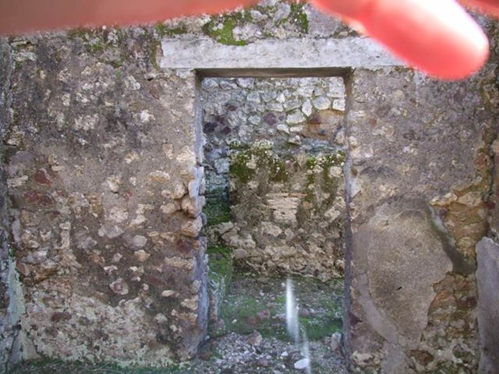 IX.9.a Pompeii. March 2009. Doorway in west wall of cubiculum “m”, leading to stairs to upper floor.