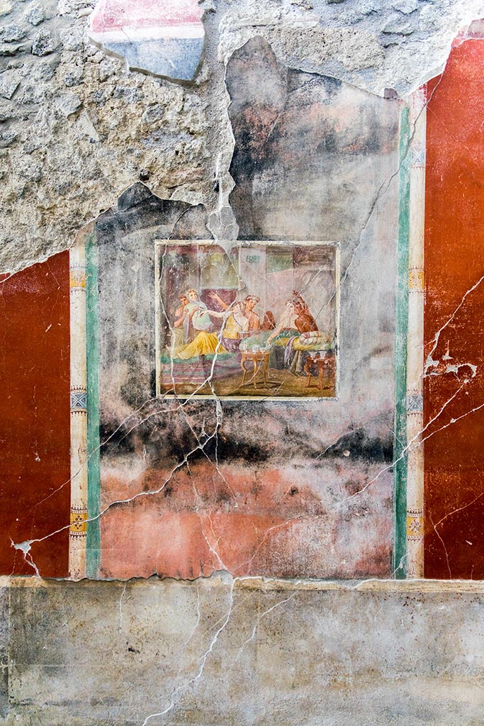 IX.12.6 Pompeii. July 2024. 
Room “m”, west wall of triclinium with central painting. Photo courtesy of Johannes Eber.
