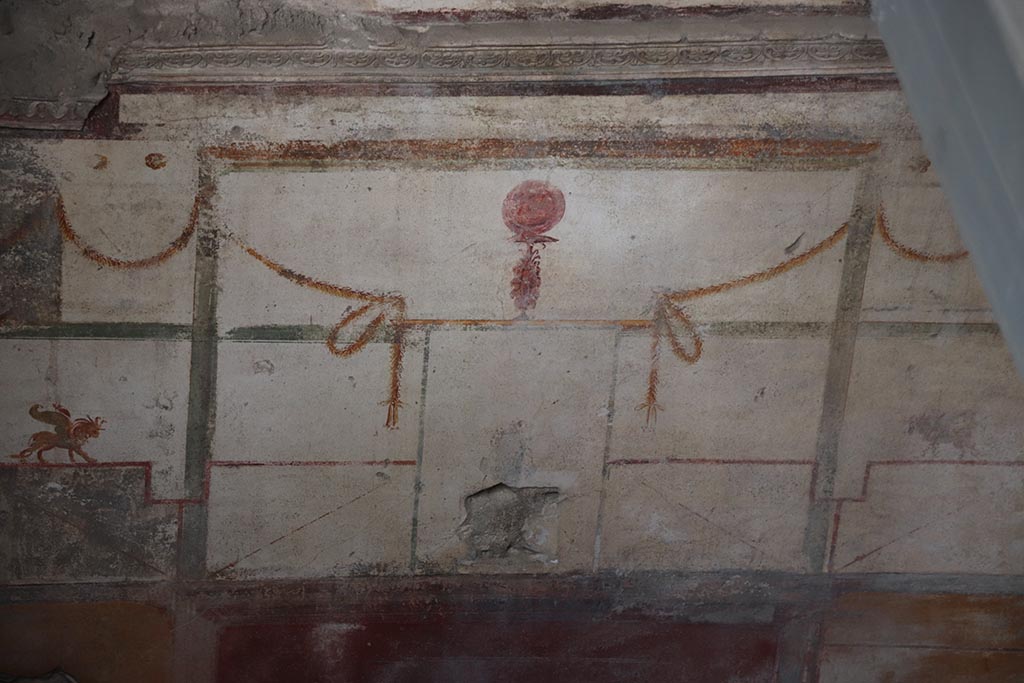 IX.12.9 Pompeii. October 2024. Room 12, detail from upper centre of north wall. Photo courtesy of Klaus Heese.