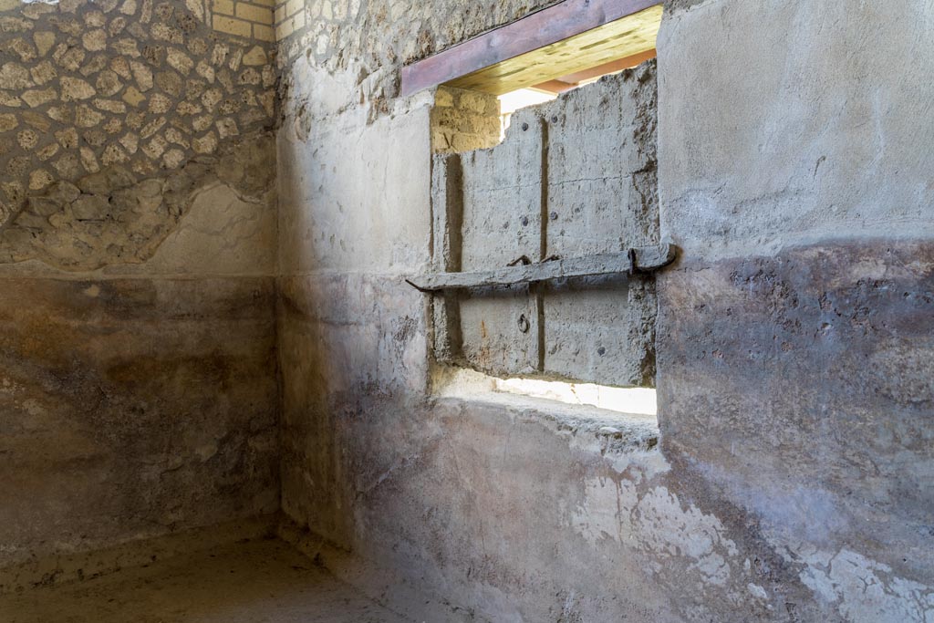 Villa Regina, Boscoreale. October 2021. 
Room IXbis, looking towards north wall with cast of window shutters in torcularium. Photo courtesy of Johannes Eber.

