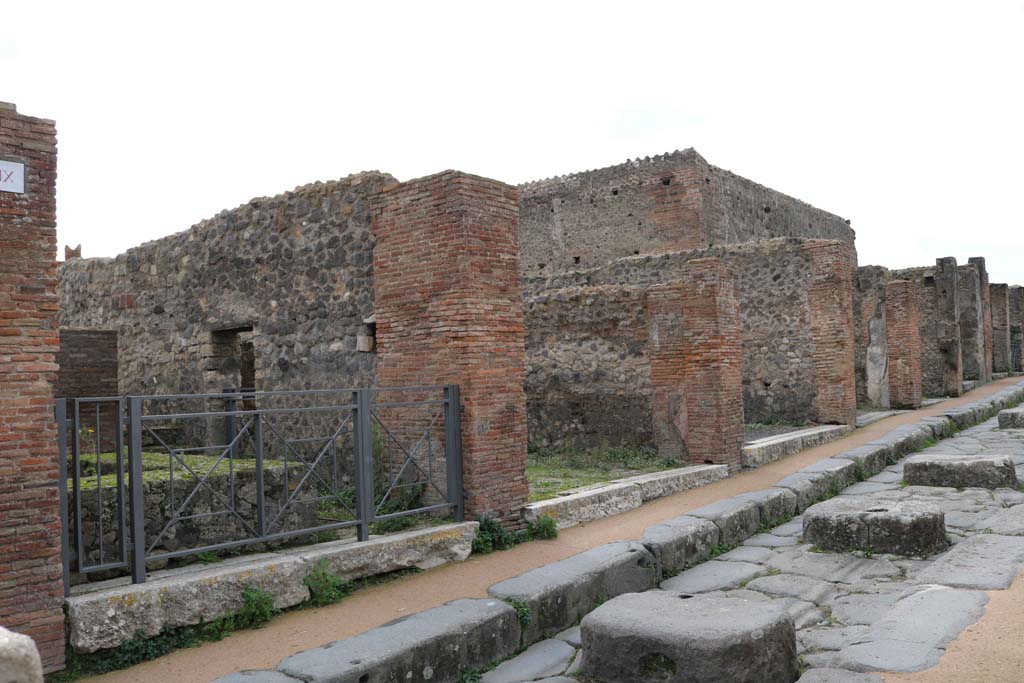 Via degli Augustali, south side, Pompeii. December 2018. 
Looking west from entrance doorway at VII.9.30, on left. Photo courtesy of Aude Durand.

