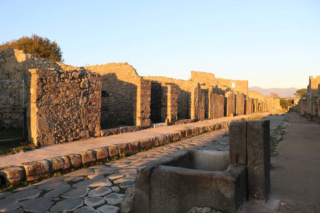 Via di Nola, north side. December 2018. 
Looking north-east along insula V.3 and V.4, from near fountain at IX.8.1, on south side. Photo courtesy of Aude Durand.
