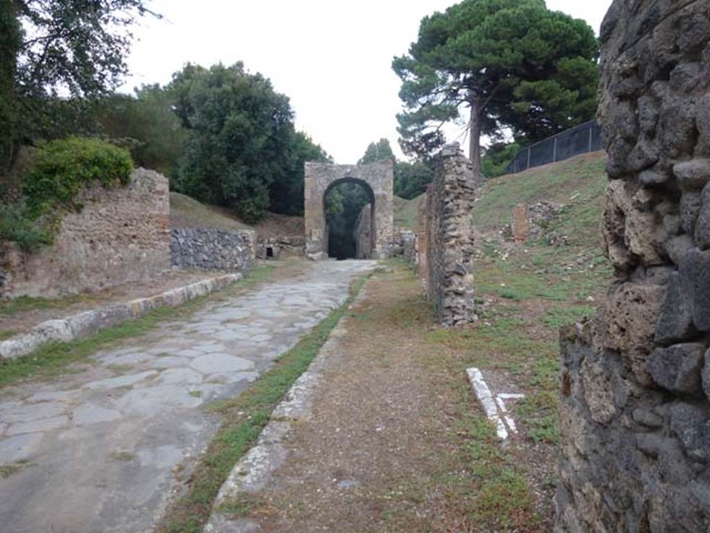 Via di Nola, September 2011. Looking east towards Nola Gate, with IV.5.d on left, and III.11.3-4 on right.  Photo courtesy of Michael Binns.
